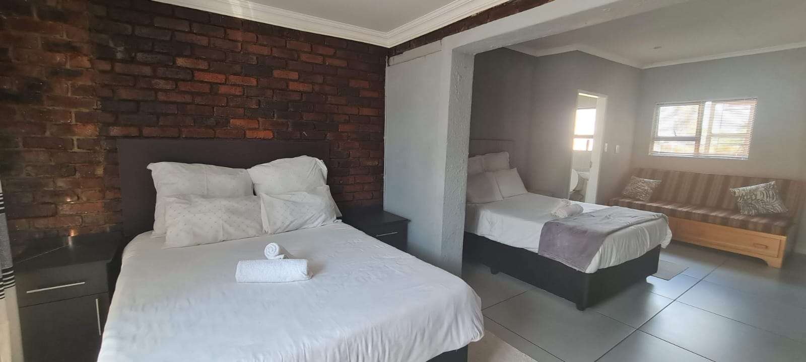 Guest bedroom with multiple beds