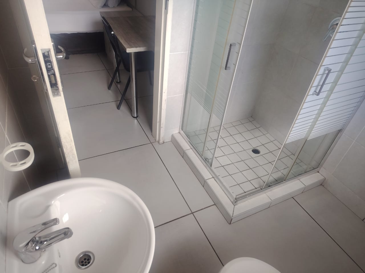 View from the bathroom into a shower room bedroom at Zea85 B&B